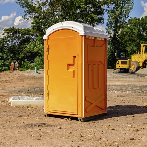 how often are the porta potties cleaned and serviced during a rental period in Chapman KS